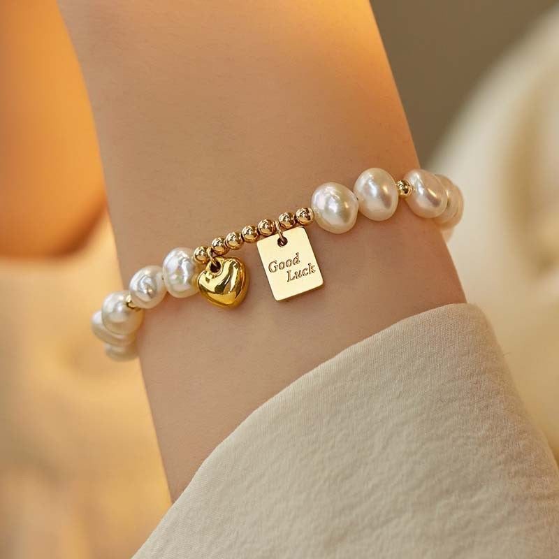 "Charming Fortunes" - Pearl Bracelet with Gold Accents and Lucky Charms